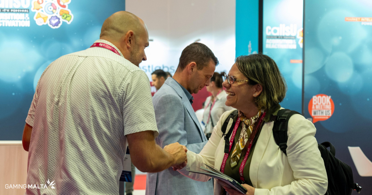 Delegates greeting each other during SBC Summit Lisbon 2026