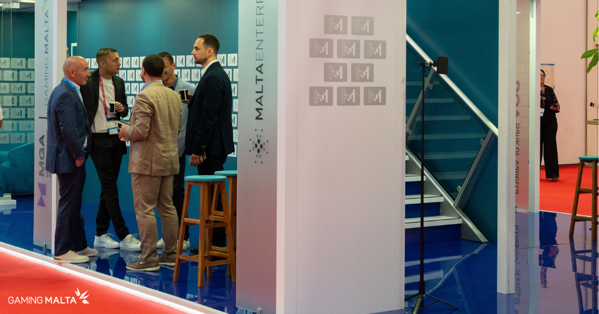 Delegates meeting inside the Make It in Malta booth at SBC Summit Lisbon 2026